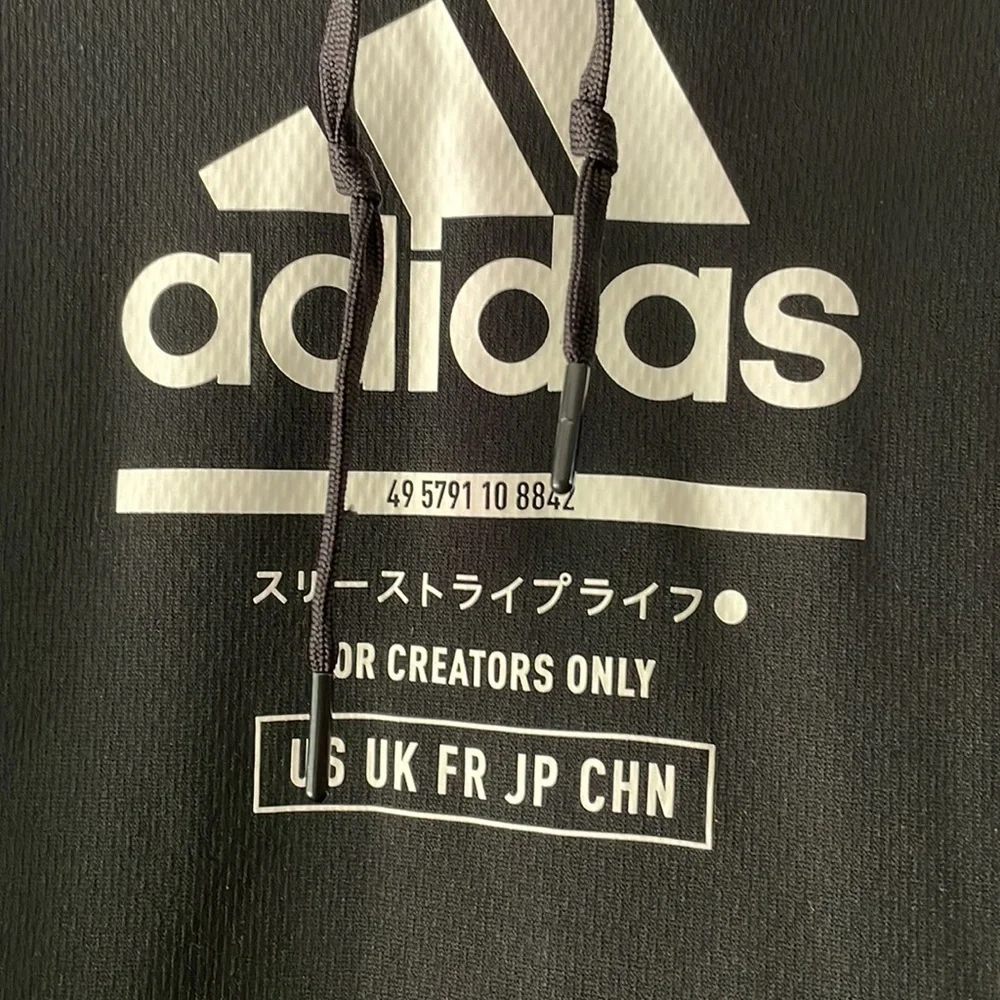 Adidas men’s “For creators only” black & white dri-fit hoodie